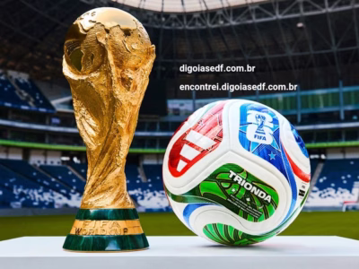 Taça da copa do mundo, e bola da Copa do Mundo, em um estádio.